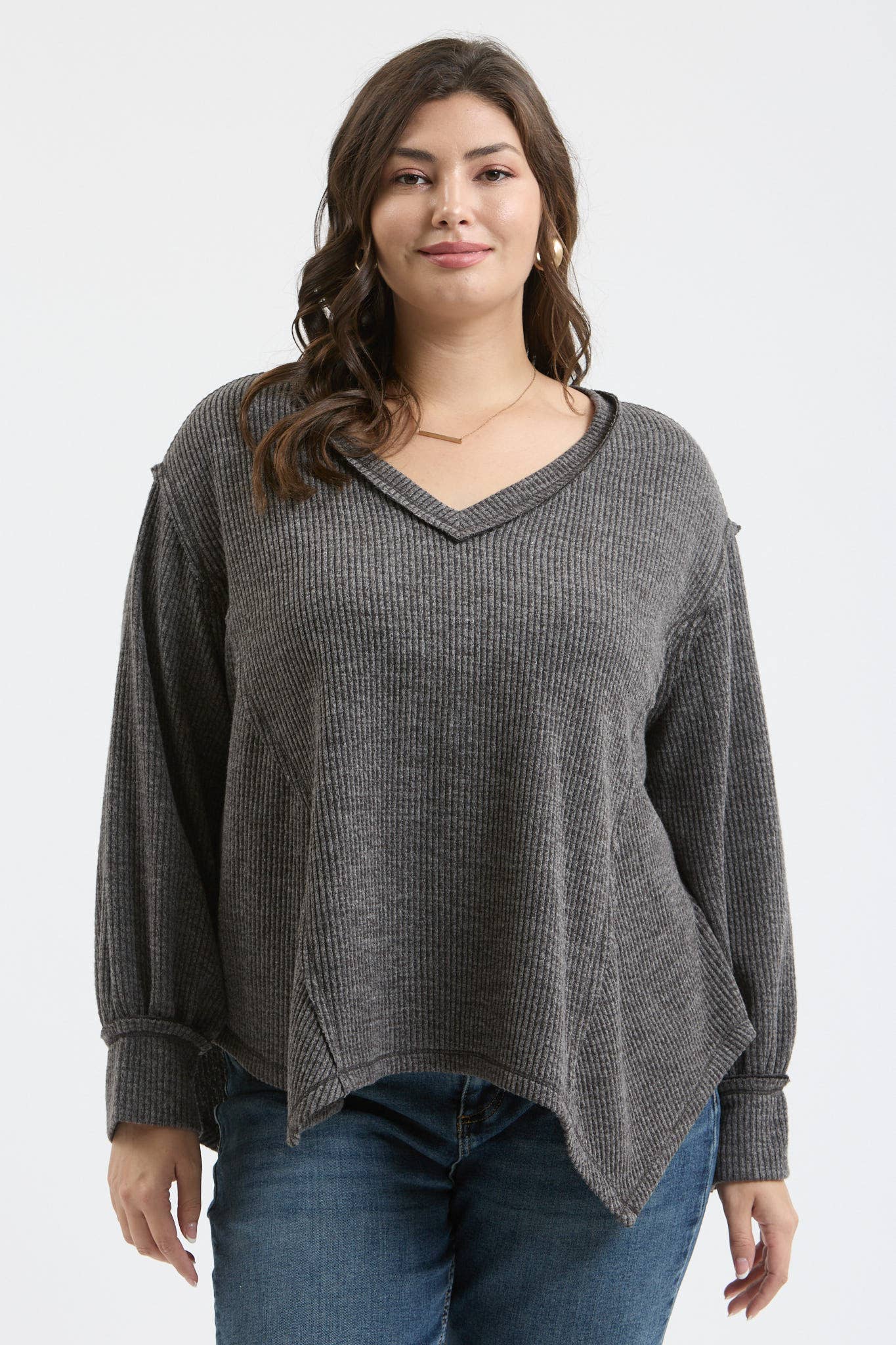 PLUS V NECK ASYMMETRICAL HEM LONG SLEEVE KNIT TOP