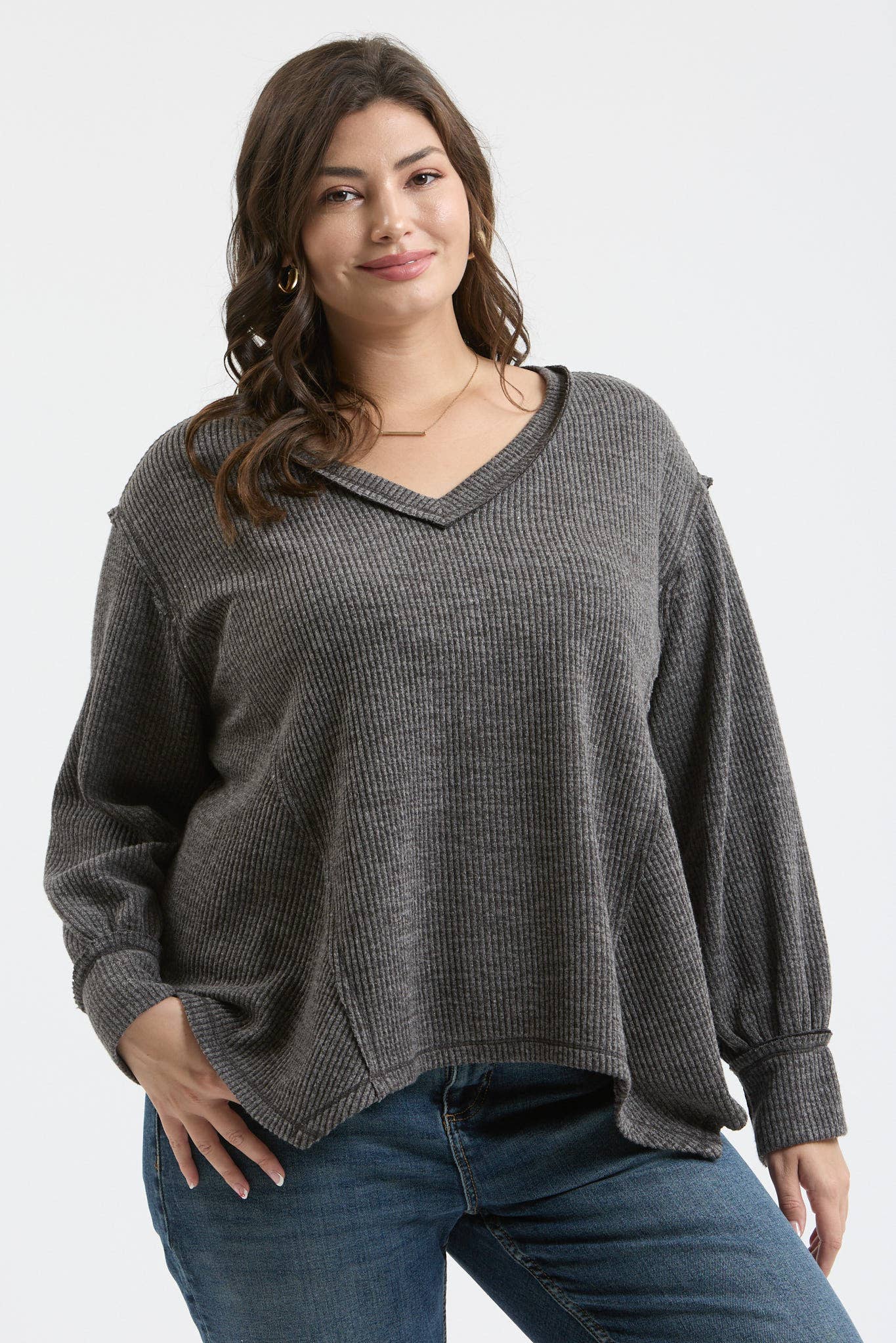 PLUS V NECK ASYMMETRICAL HEM LONG SLEEVE KNIT TOP